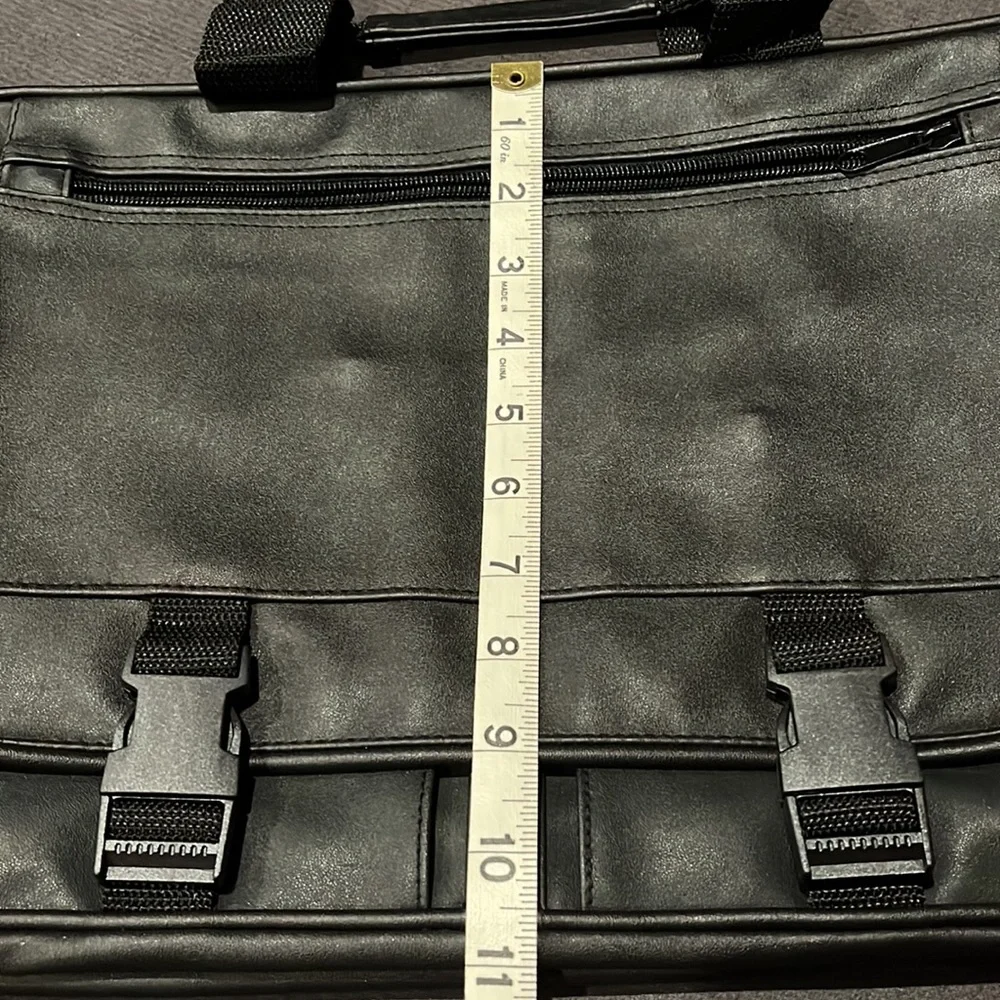 Briefcase, Black, Handles and Shoulder Straps lots of storage.